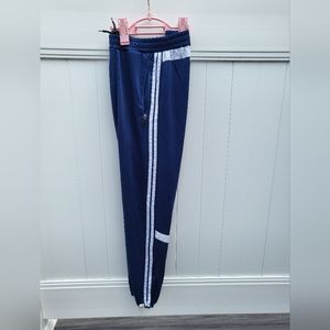 Blue 2 stripe track pants similar to Adidas training pants